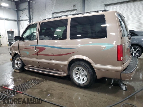 2002 Chevrolet Astro with VIN 1GNDM19XX2B149977, listed as a Copart auction lot 73148144 with 147,742 mi miles and Salvage Title. Bid and sale history available at carsss.com. Image 2.