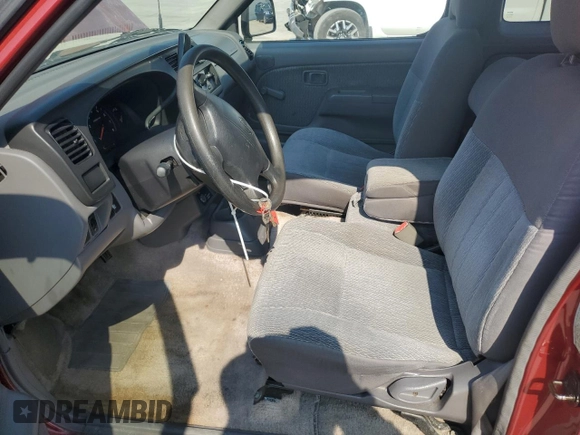 2000 Nissan Frontier XE with VIN 1N6DD26SXYC393054, listed as a Copart auction lot 62410125 with 106,319 mi miles and Salvage title. Bid and sale history available at DreamBid. Image 7.
