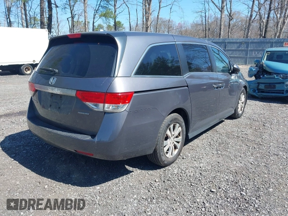 2016 Honda Odyssey SE with VIN 5FNRL5H39GB048487, listed as a IAAI auction lot 42059132 with 140,411 mi miles and . Bid and sale history available at DreamBid. Image 4.