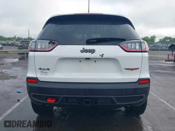 2022 Jeep Cherokee Trailhawk with VIN 1C4PJMBX1ND500729, listed as a IAAI auction lot 42235098 with 60,354 mi miles and . Bid and sale history available at DreamBid. Image 16.