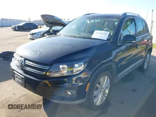 2012 Volkswagen Tiguan S with VIN WVGBV7AX4CW607546, listed as a IAAI auction lot 41295646 with 115,670 mi miles and . Bid and sale history available at DreamBid. Image 2.