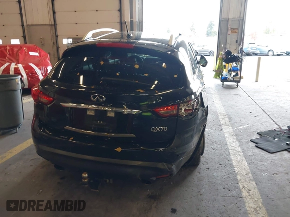 2016 Infiniti QX70 z VIN JN8CS1MW7GM400558, wystawiony jako IAAI lot #40917829 z przebiegiem 149 885 mil mil oraz . Historia ofert i sprzedaży dostępna na DreamBid. Obrazek 16.