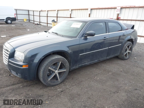 2007 Chrysler 300 Touring with VIN 2C3LK53G27H882957, listed as a IAAI auction lot 41350117 with 214,055 mi miles. Bid and sale history available at carsss.com. Image 2.