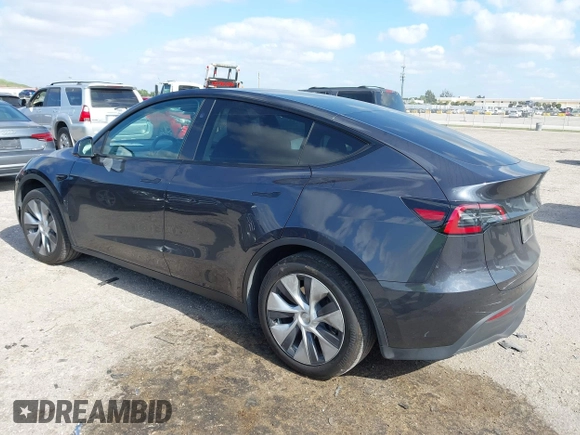 2024 Tesla Model Y Long Range z VIN 7SAYGDEE0RA263842, wystawiony jako IAAI lot #42106339 z przebiegiem 48 447 mil mil oraz . Historia ofert i sprzedaży dostępna na DreamBid. Obrazek 3.