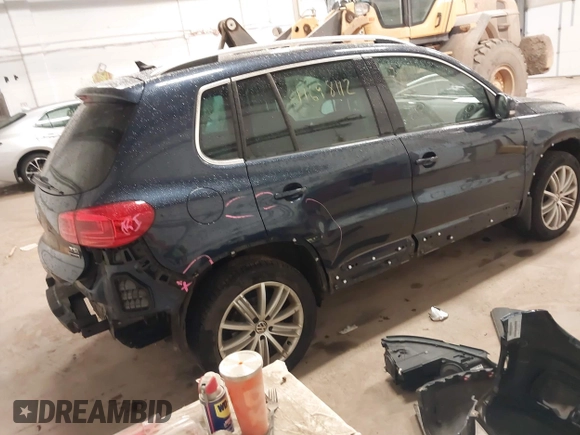 2016 Volkswagen Tiguan S with VIN WVGBV7AX6GW029794, listed as a IAAI auction lot 41698112 with 73,084 mi miles and . Bid and sale history available at DreamBid. Image 4.