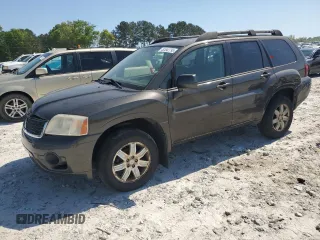 2011 Mitsubishi Endeavor LS z VIN 4A4JN2AS1BE014120, wystawiony jako Copart lot #52542795 z przebiegiem 244 611 mil mil oraz Szkoda całkowita • Salvage title. Historia ofert i sprzedaży dostępna na DreamBid. Obrazek 1.