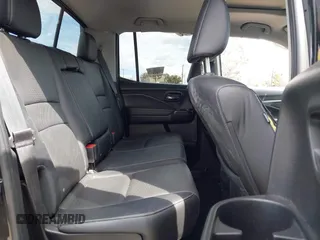 2020 Honda Ridgeline RTL with VIN 5FPYK3F53LB030107, listed as a IAAI auction lot 41933517 with 93,373 mi miles and . Bid and sale history available at DreamBid. Image 8.