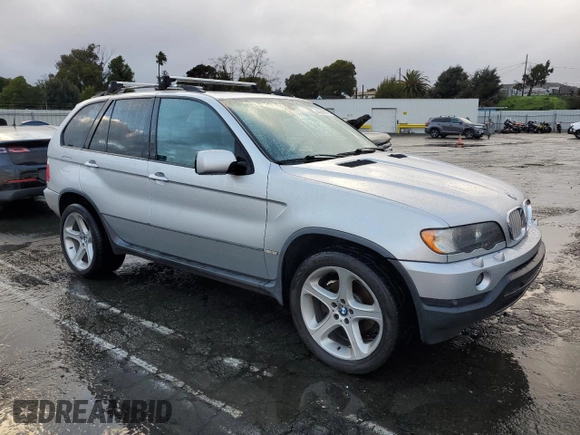 2001 BMW X5 4.4i with VIN WBAFB33581LH16948, listed as a Copart auction lot 44383785 with 143,249 mi miles and Salvage Title. Bid and sale history available at carsss.com. Image 4.