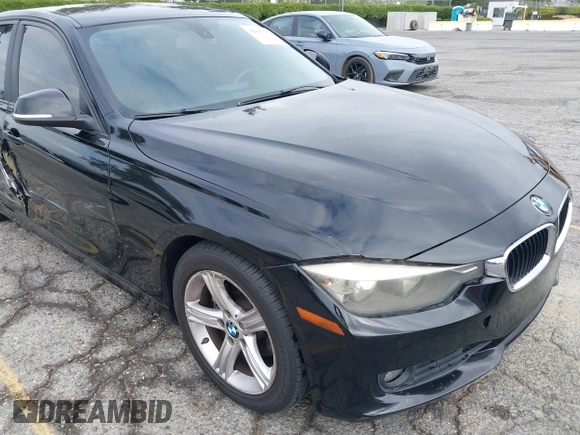 2014 BMW 3 Series 320i with VIN WBA3B1G57ENS80800, listed as a IAAI auction lot 42097683 with 152,924 mi miles. Bid and sale history available at carsss.com. Image 17.