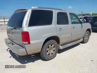 2005 Cadillac Escalade with VIN 1GYEK63NX5R141147, listed as a IAAI auction lot 42518716 with 231,540 mi miles and . Bid and sale history available at DreamBid. Image 4.