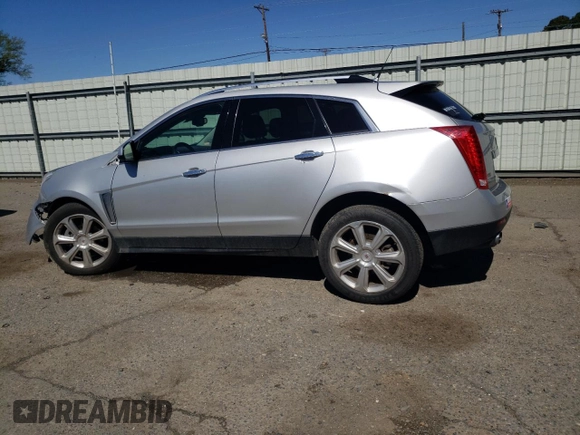 2014 Cadillac SRX Performance Collection z VIN 3GYFNCE38ES559239, wystawiony jako Copart lot #49843955 z przebiegiem 99 497 mil mil oraz Szkoda całkowita • Salvage title. Historia ofert i sprzedaży dostępna na DreamBid. Obrazek 2.