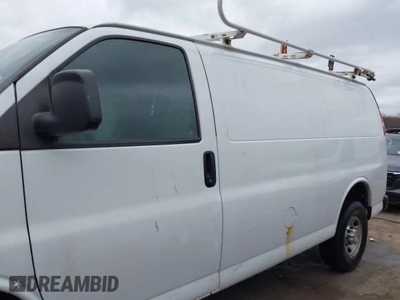 2015 Chevrolet Express Cargo Van with VIN 1GCWGFCFXF1259591, listed as a IAAI auction lot 42029679 with 144,023 mi miles. Bid and sale history available at carsss.com. Image 14.