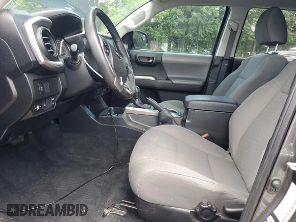 2022 Toyota Tacoma SR with VIN 3TYAX5GN2NT046114, listed as a Copart auction lot 61281875 with 57,726 mi miles and Salvage title. Bid and sale history available at DreamBid. Image 7.