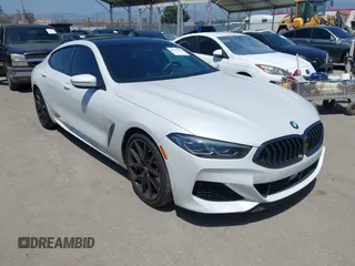 2022 BMW 8 Series M850i z VIN WBAGV8C02NCH87808, wystawiony jako IAAI lot #42255995 z przebiegiem 34 285 mil mil oraz . Historia ofert i sprzedaży dostępna na DreamBid. Obrazek 1.