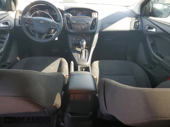 2018 Ford Focus SE with VIN 1FADP3FE4JL308909, listed as a Copart auction lot 61489005 with 58,613 mi miles and Salvage title. Bid and sale history available at DreamBid. Image 8.