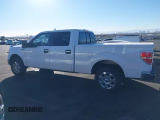 2014 Ford F-150 XL with VIN 1FTFW1CT8EKF75494, listed as a IAAI auction lot 41403654 with 144,432 mi miles. Bid and sale history available at carsss.com. Image 14.