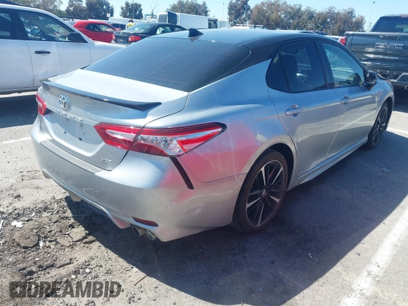 2020 Toyota Camry XSE with VIN 4T1K61AK1LU318098, listed as a IAAI auction lot 41838182 with 64,118 mi miles and . Bid and sale history available at DreamBid. Image 4.