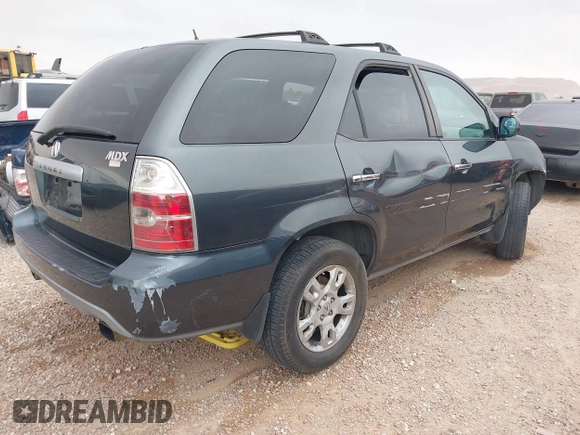 2006 Acura MDX Touring w/Navi with VIN 2HNYD18876H523408, listed as a IAAI auction lot 41756670 with 219,796 mi miles. Bid and sale history available at carsss.com. Image 4.