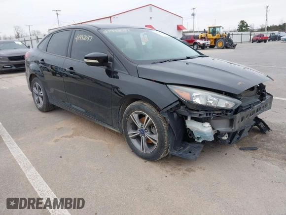 2017 Ford Focus SE with VIN 1FADP3FE4HL307110, listed as a IAAI auction lot 41992037 with 54,380 mi miles and . Bid and sale history available at DreamBid. Image 1.