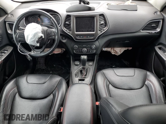 2019 Jeep Cherokee Trailhawk Elite with VIN 1C4PJMBX7KD140720, listed as a Copart auction lot 64268064 with 61,747 mi miles and Salvage Title. Bid and sale history available at carsss.com. Image 8.