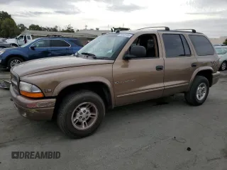 2000 Dodge Durango z VIN 1B4HR28Y4YF187411, wystawiony jako Copart lot #79060184 z przebiegiem 275 571 mil mil oraz Szkoda całkowita • Salvage title. Historia ofert i sprzedaży dostępna na DreamBid. Obrazek 1.