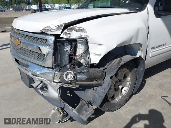 2013 Chevrolet Silverado 1500 LT with VIN 3GCPKSE71DG358722, listed as a IAAI auction lot 42128592 with 206,779 mi miles and . Bid and sale history available at DreamBid. Image 6.