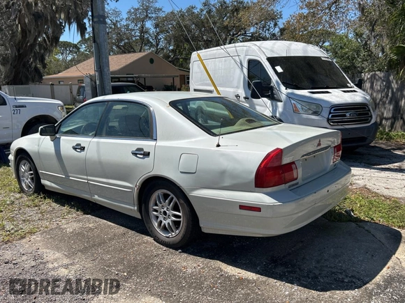 2000 Mitsubishi Diamante LS z VIN 6MMAP67P4YT001142, wystawiony jako Copart lot #49667135 z przebiegiem 243 861 mil mil oraz Tytuł czysty. Historia ofert i sprzedaży dostępna na DreamBid. Obrazek 3.