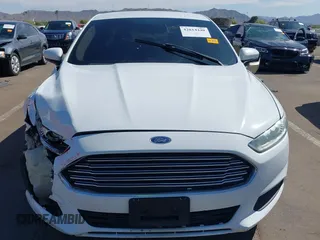 2014 Ford Fusion S with VIN 3FA6P0G78ER379352, listed as a IAAI auction lot 42014440 with 175,414 mi miles and . Bid and sale history available at DreamBid. Image 12.