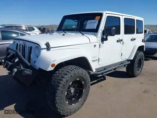 2012 Jeep Wrangler Unlimited Sahara with VIN 1C4BJWEG2CL117080, listed as a IAAI auction lot 41868590 with 92,475 mi miles. Bid and sale history available at carsss.com. Image 17.