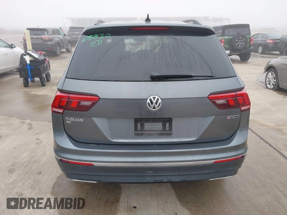 2021 Volkswagen Tiguan SE with VIN 3VV2B7AX8MM143189, listed as a IAAI auction lot 41646843 with 56,672 mi miles and . Bid and sale history available at DreamBid. Image 16.
