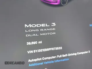 2023 Tesla Model 3 Long Range with VIN 5YJ3E1EB6PF673532, listed as a IAAI auction lot 41885716 with 39,690 mi miles and . Bid and sale history available at DreamBid. Image 7.