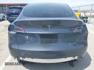 2023 Tesla Model Y Long Range z VIN 7SAYGDEE1PA158661, wystawiony jako IAAI lot #41983897 z przebiegiem 20 176 mil mil oraz . Historia ofert i sprzedaży dostępna na DreamBid. Obrazek 17.