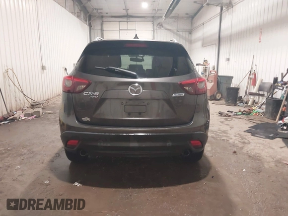 2016 Mazda CX-5 Grand Touring with VIN JM3KE4DY0G0732843, listed as a IAAI auction lot 41520889 with 149,798 mi miles. Bid and sale history available at carsss.com. Image 16.