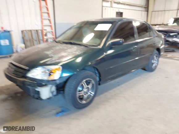 2002 Honda Civic LX with VIN 2HGES16612H595748, listed as a IAAI auction lot 41356181 with 299,899 mi miles. Bid and sale history available at carsss.com. Image 2.