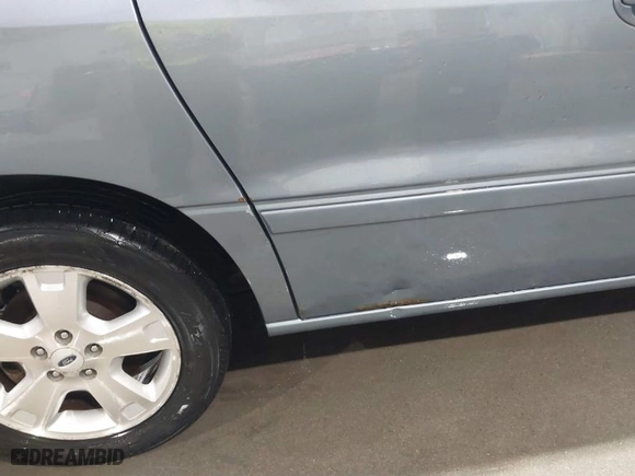 2005 Ford Freestar Wagon SEL with VIN 2FMZA52265BA19556, listed as a IAAI auction lot 41409009 with 259,346 mi miles. Bid and sale history available at carsss.com. Image 6.
