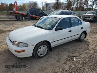1996 Geo Prizm z VIN 1Y1SK5261TZ028032, wystawiony jako Copart lot #77434654 z przebiegiem 54 665 mil mil oraz Tytuł czysty. Historia ofert i sprzedaży dostępna na DreamBid. Obrazek 1.
