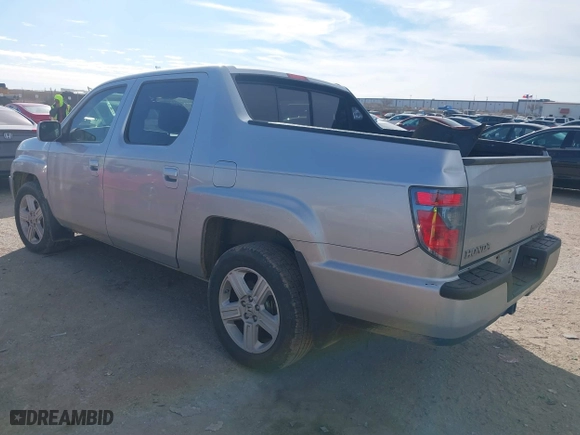 2014 Honda Ridgeline RTL with VIN 5FPYK1F5XEB008421, listed as a IAAI auction lot 41266050 with 86,490 mi miles. Bid and sale history available at carsss.com. Image 3.