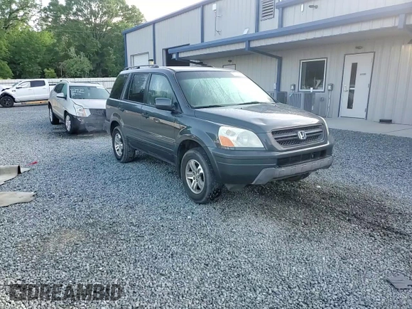 2005 Honda Pilot EX-L z VIN 2HKYF18705H564606, wystawiony jako Copart lot #55747785 z przebiegiem 272 432 mil mil oraz Szkoda całkowita • Salvage title. Historia ofert i sprzedaży dostępna na DreamBid. Obrazek 13.