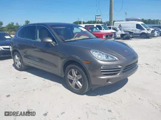 2013 Porsche Cayenne Diesel with VIN WP1AF2A27DLA41257, listed as a IAAI auction lot 42063020 with 142,849 mi miles. Bid and sale history available at carsss.com. Image 1.