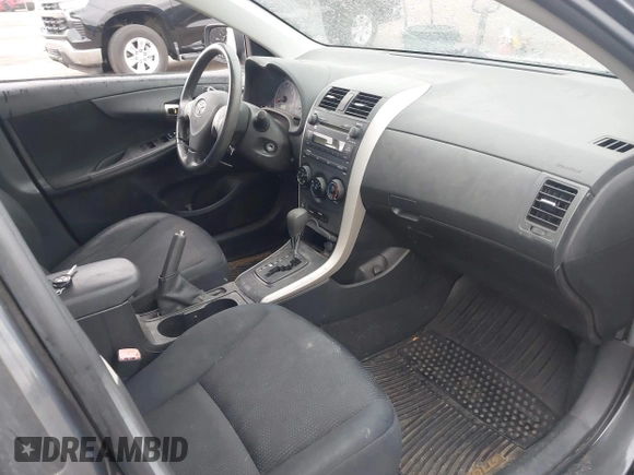 2009 Toyota Corolla with VIN 1NXBU40E99Z050218, listed as a IAAI auction lot 42208256 with 149,796 mi miles. Bid and sale history available at carsss.com. Image 5.