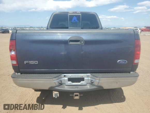 2001 Ford F-150 XL with VIN 1FTRX18L71NA27627, listed as a Copart auction lot 64190715 with 105,503 mi miles and Salvage title. Bid and sale history available at DreamBid. Image 6.