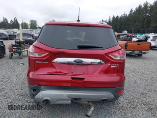 2014 Ford Escape Titanium with VIN 1FMCU9J9XEUD71715, listed as a IAAI auction lot 42127982 with 96,549 mi miles and . Bid and sale history available at DreamBid. Image 6.