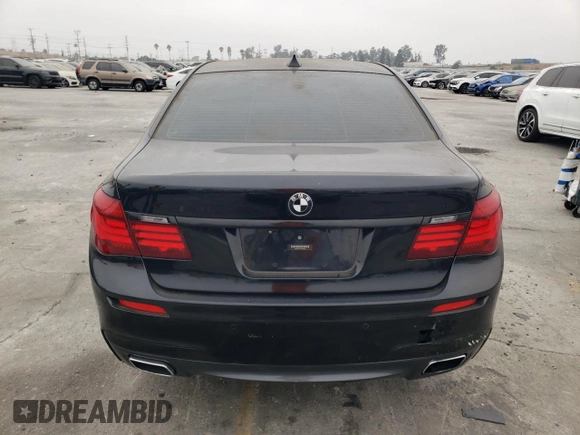 2013 BMW 7 Series 740Li with VIN WBAYE4C51DD137687, listed as a Copart auction lot 76103944 with 134,609 mi miles and Salvage title. Bid and sale history available at DreamBid. Image 6.
