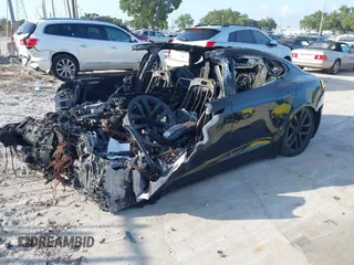 2022 Tesla Model S Plaid z VIN 5YJSA1E64NF477659, wystawiony jako IAAI lot #42358072 z przebiegiem Nie podano mil oraz . Historia ofert i sprzedaży dostępna na DreamBid. Obrazek 2.