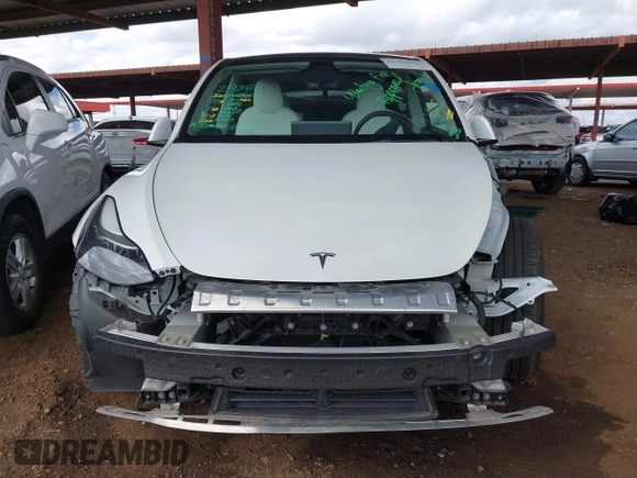 2022 Tesla Model Y Performance with VIN 7SAYGDEF4NF449986, listed as a IAAI auction lot 41754916 with 64,384 mi miles and . Bid and sale history available at DreamBid. Image 13.