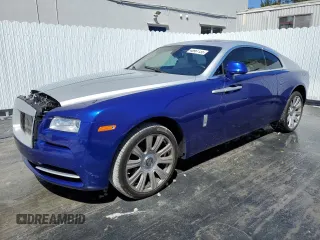 2015 Rolls-Royce Wraith z VIN SCA665C55FUX85086, wystawiony jako Copart lot #48961135 z przebiegiem 31 124 mil mil oraz Szkody całkowita. Historia ofert i sprzedaży dostępna na DreamBid. Obrazek 1.