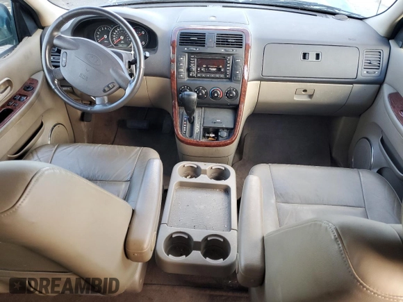 2002 Kia Sedona LX with VIN KNDUP131426217512, listed as a Copart auction lot 80928774 with 163,176 mi miles and Salvage Title. Bid and sale history available at carsss.com. Image 8.