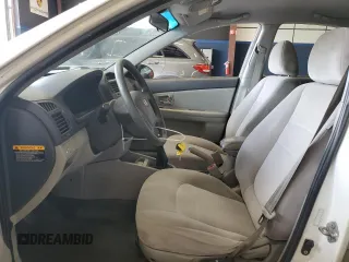 2008 Kia Spectra EX with VIN KNAFE121185494050, listed as a Copart auction lot 68599644 with 165,610 mi miles and Clean Title. Bid and sale history available at carsss.com. Image 7.