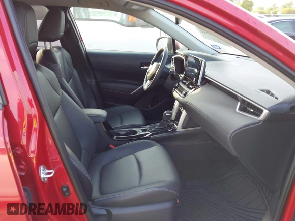 2022 Toyota Corolla Cross XLE with VIN 7MUEAAAG2NV004274, listed as a IAAI auction lot 42057280 with 21,734 mi miles and . Bid and sale history available at DreamBid. Image 5.