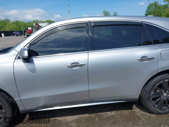 2018 Acura MDX Technology with VIN 5J8YD4H57JL003610, listed as a IAAI auction lot 42127585 with 82,633 mi miles and . Bid and sale history available at DreamBid. Image 14.